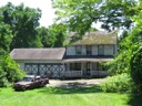 Farm house on the corner of Caley Rd and Beidler Rd. Now Caley Court development. Courtesy of Russell Rubert.